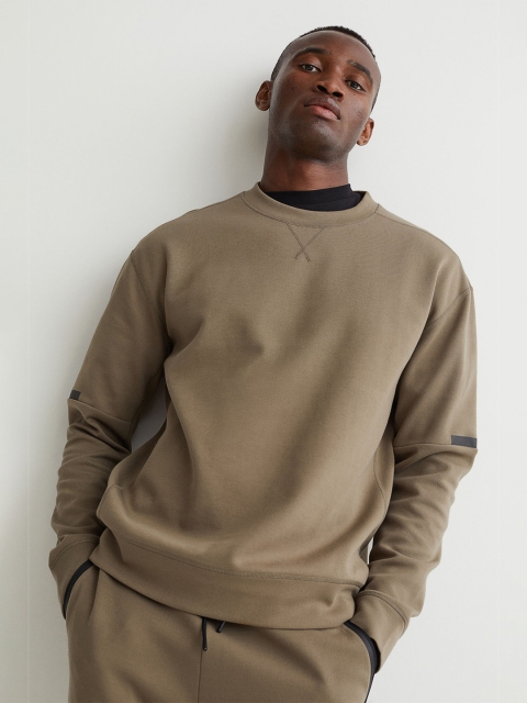

H&M Men Green Solid Relaxed Fit Sports Top