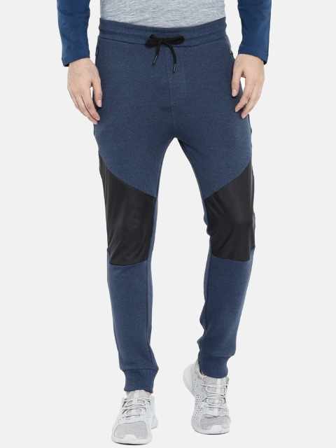 

Proline Men Teal Blue & Black Solid Track Pants