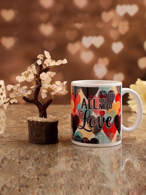 

Ferns N Petals White & Brown Printed Ceramic Glossy Cup with Tree Showpiece