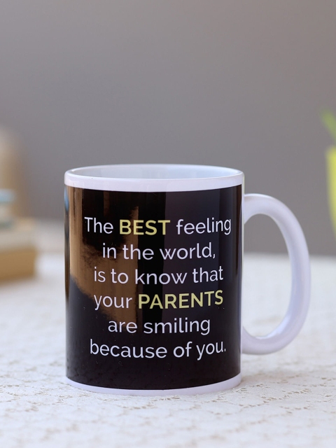 

Ferns N Petals Multicolor Make Your Parents Smile Ceramic Matte Mug, White