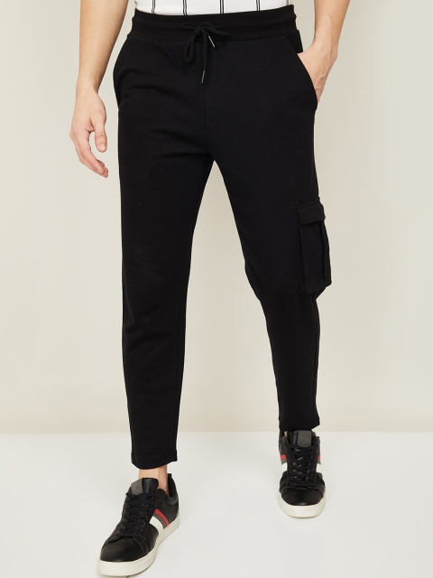 

Bossini Men Black Solid Cotton Track Pants