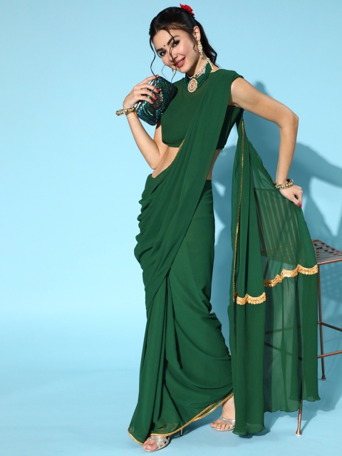 

Inddus Women Bottle Green Solid Saree with Accordian Pleated Blouse & Pallu