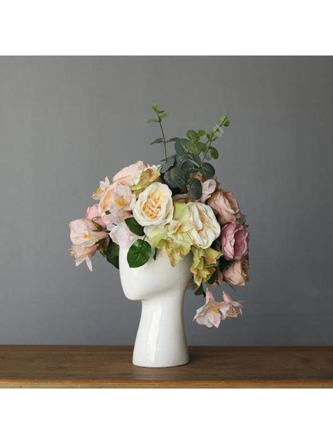 

THE ARTMENT White Solid Surreal Ceramic Flower Head Planter
