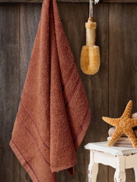 

Aura Brown Solid 380 GSM Super Absorbent Cotton Bath Towel