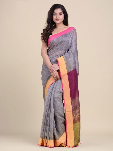 

Charukriti Grey & Mustard Pure Linen Saree