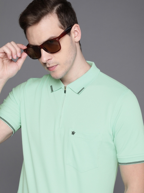 

Louis Philippe Men Teal Blue5 Solid Polo Collar Casual T-shirt