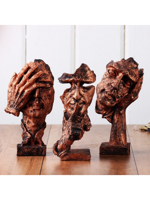 

Ferns N Petals Set Of 3 Orange & Black Human Face Sculptures Showpieces