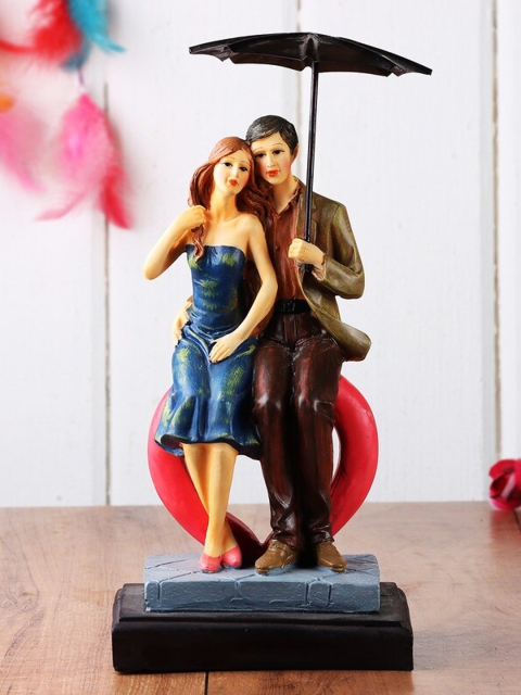 

Ferns N Petals Brown & Yellow Romantic Love Couple Showpiece