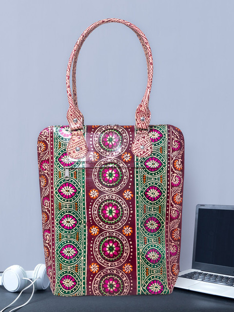 

Golden Peacock Women Maroon & Orange Printed Leather Laptop Bag