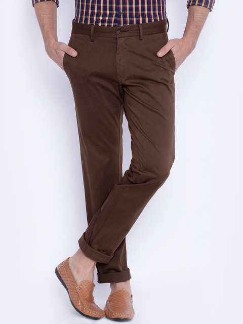 

Basics Men Brown Solid Flared Fit Chinos