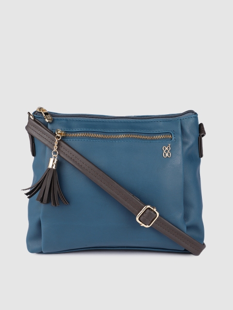 

Baggit Atlantic Blue Solid Regular Structured Sling Bag with Tasselled Detail
