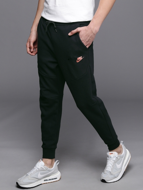 

Nike Sportswear Men Black Brand Logo Slim Fit Mid-Rise Regular Joggers