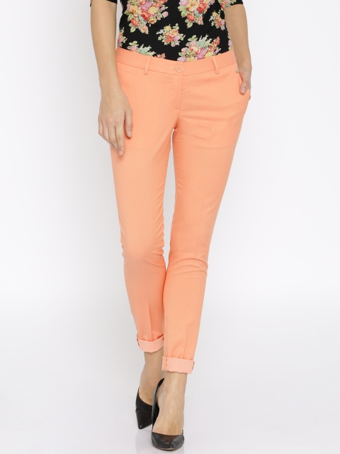 

Park Avenue Women Orange Solid Regular Fit Flat-Front Trousers
