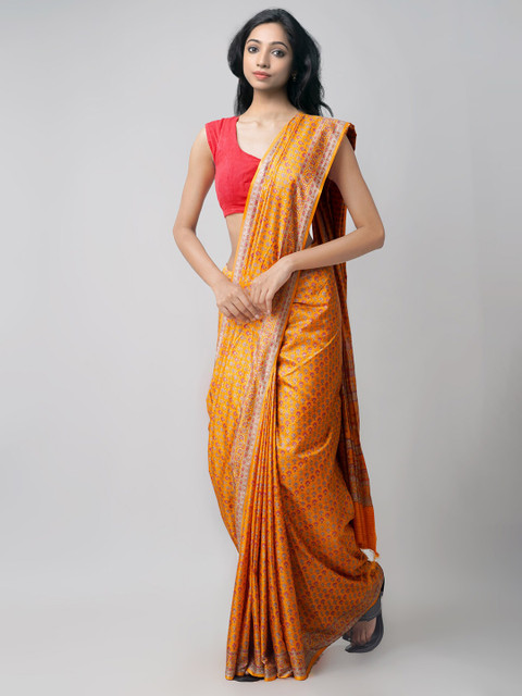 

Unnati Silks Orange & White Ethnic Motifs Silk Blend Mysore Silk Saree