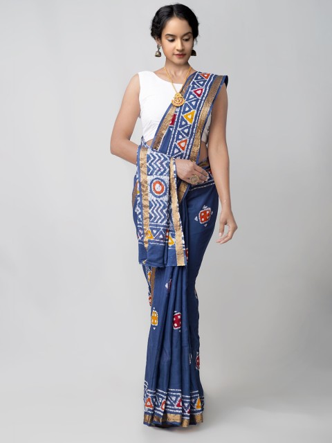 

Unnati Silks Navy Blue & Mustard Batik Mulmul Cotton Block Print Saree