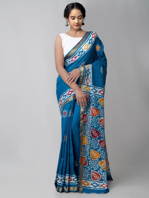 

Unnati Silks Teal & White Batik Handloom Sustainable Zari Pure Cotton Block Print Saree