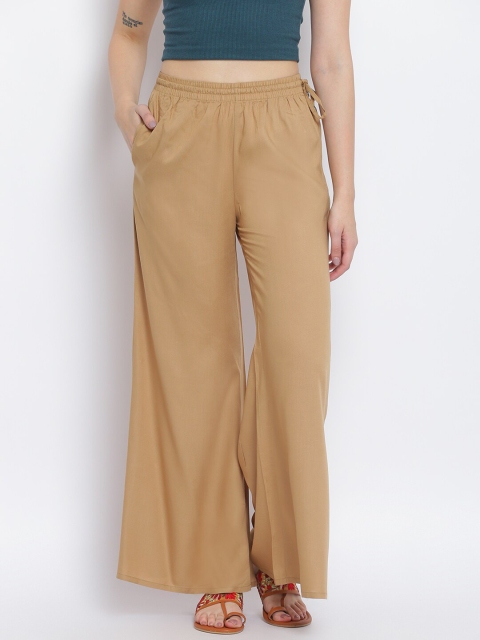 

Lakshita Women Beige Solid Flared Chambray Palazzos