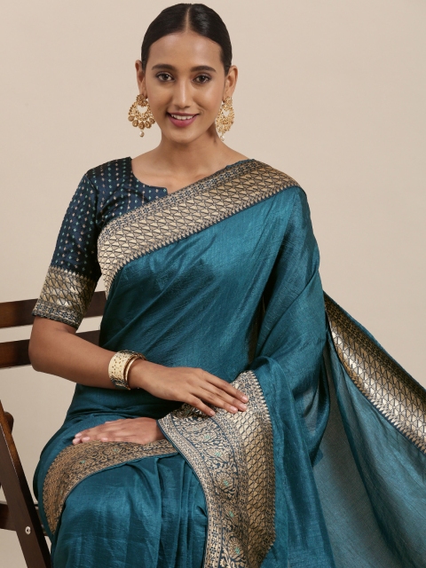 

Mitera Teal Blue Jacquard Border Solid Saree