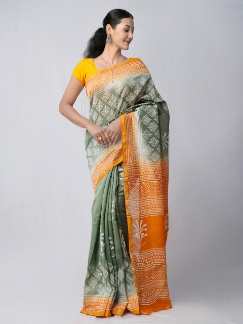 

Unnati Silks Green & Orange Ethnic Motifs Silk Cotton Hand Block Printed Chanderi Saree