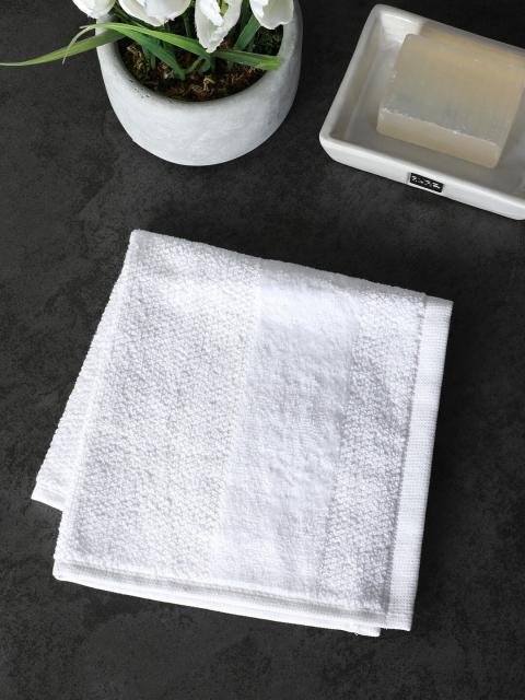 

Pure Home and Living Set Of 8 White Solid 550 GSM Cotton Face Towels