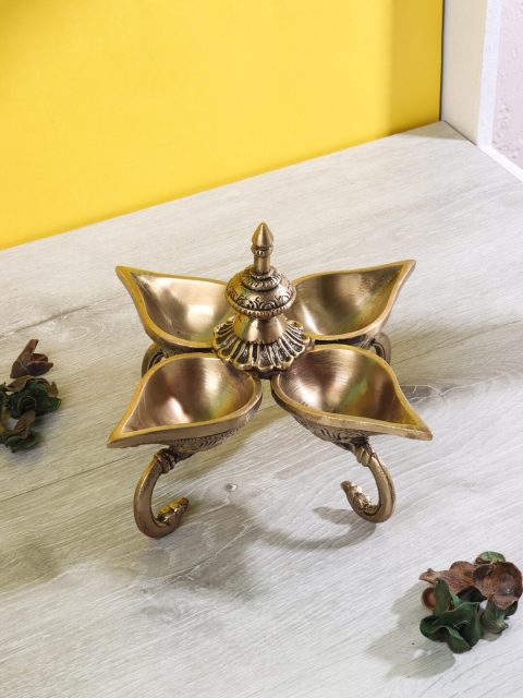 

Aapno Rajasthan Brown Brass Lamp with Four Slots