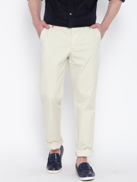 

Blackberrys Men Cream-Coloured Solid Tapered Fit Flat-Front Trousers