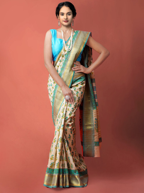 

Unnati Silks Brown & Blue Floral Zari Maheshwari Silk Jute Sico Saree