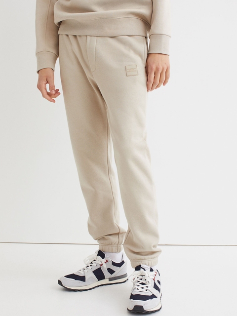 

H&M Men Beige Solid Slim-Fit Cotton Joggers