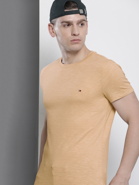 

Tommy Hilfiger Men Beige Solid Pure Cotton Slim Fit T-shirt