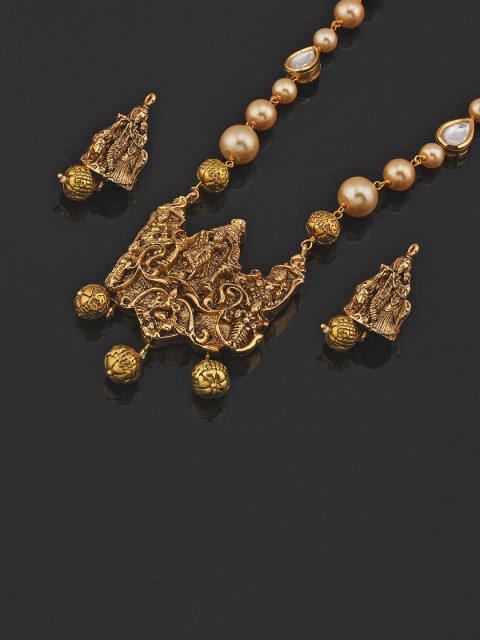 

Tistabene Gold Toned Krishna Pendant With Kundan Stones and Pearls Necklace Set