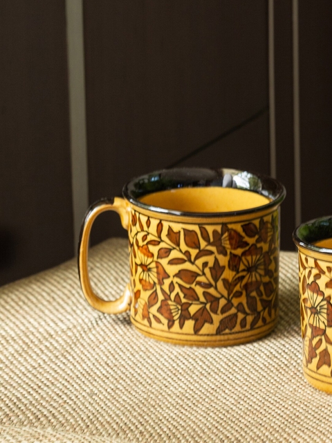 

ExclusiveLane Brown & Yellow Handcrafted Printed Ceramic Glossy Coffee Mugs