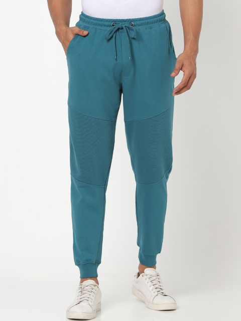 

Bewakoof Men Blue Solid Joggers