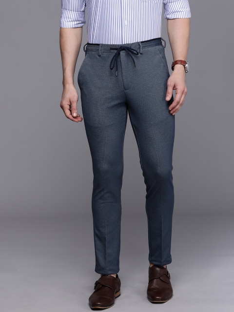 

Louis Philippe Men Blue Carrot Slim Fit Wrinkle Free Regualr Trousers
