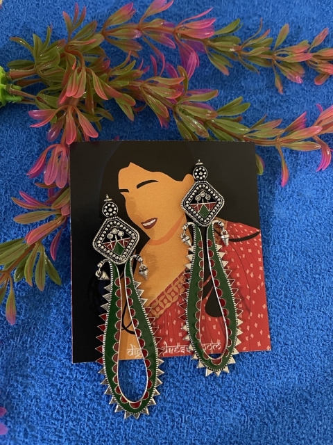 

Digital Dress Room German Silver & Green Teardrop Shaped Drop Earrings