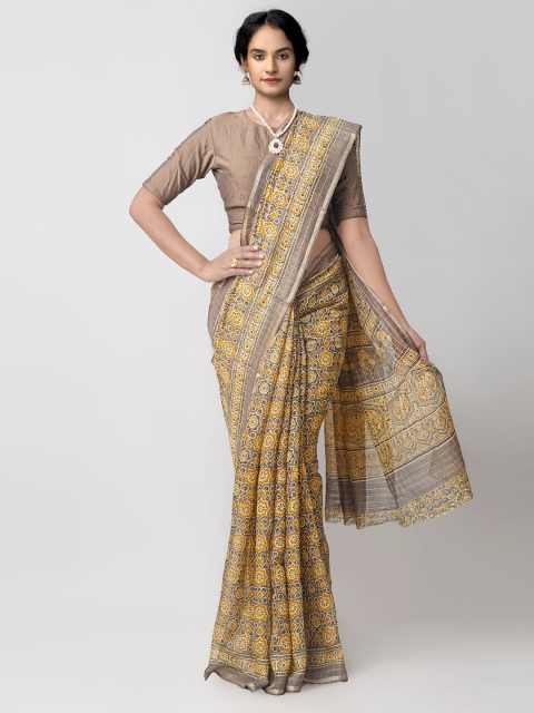 

Unnati Silks Grey & Mustard Ajrak Printed Silk Cotton Chanderi Saree