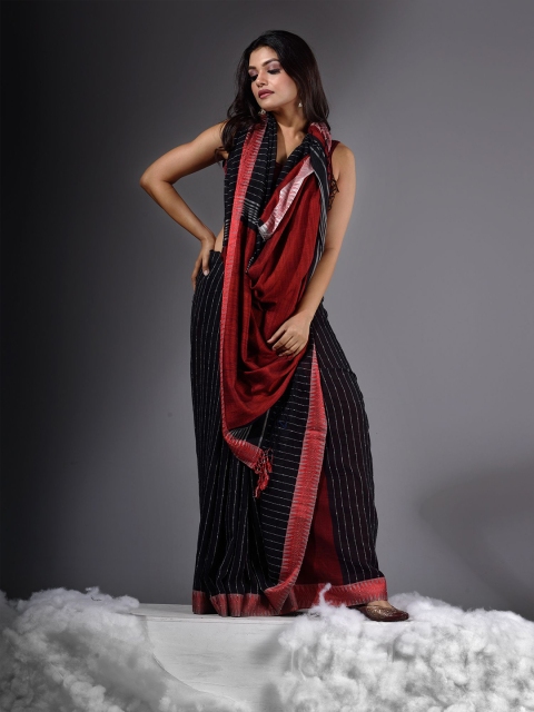 

Charukriti Women Black & Red Solid Striped Saree