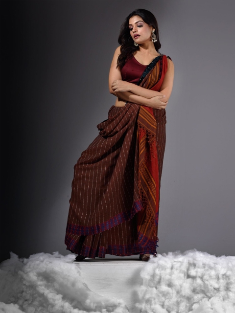 

Charukriti Brown & Red Striped Handwoven Pure Cotton Khadi Saree