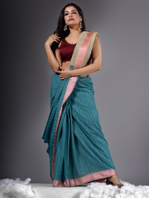 

Charukriti Teal & Magenta Woven Design Pure Cotton Khadi Saree