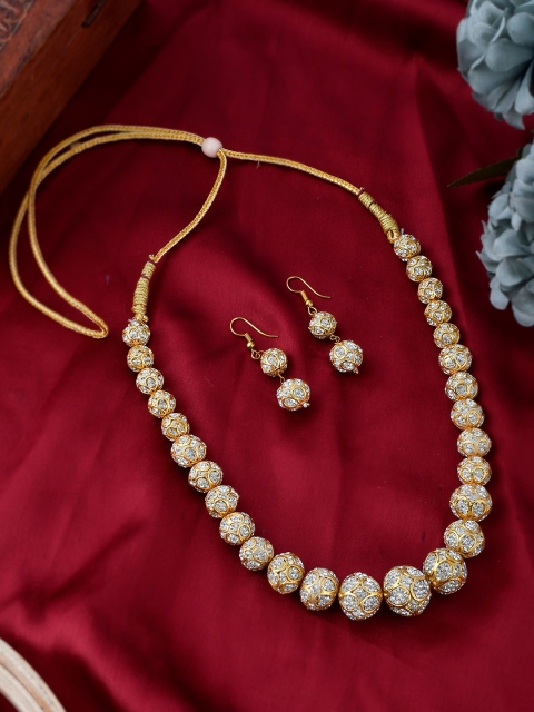 

Shoshaa Women Gold-Plated & White Artificial Stones Studded Handcrafted Jewellery Set