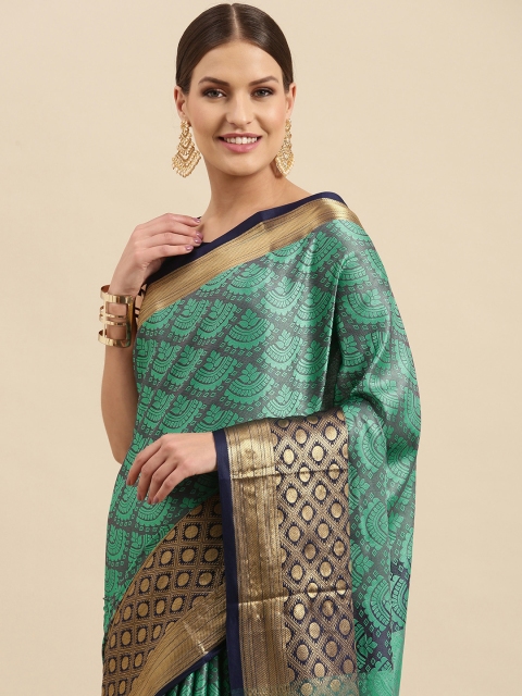 

Anouk Turquoise Blue & Gold-Toned Ethnic Motifs Woven Design Silk Blend Banarasi Saree