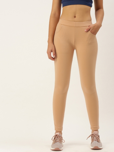 

SWAGG INDIA Women Beige Solid Training or Gym Sports Tights