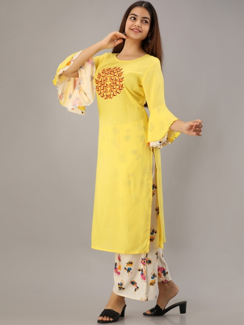 

KALINI Women Yellow Panelled Kurti with Palazzos