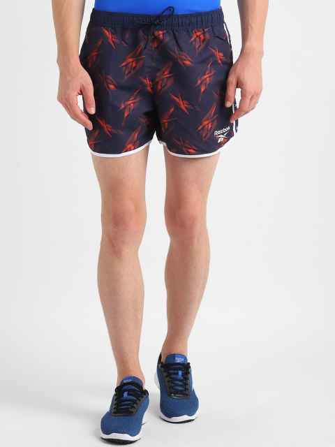

Reebok Men Navy Blue & Red Logo Printed Sports Shorts