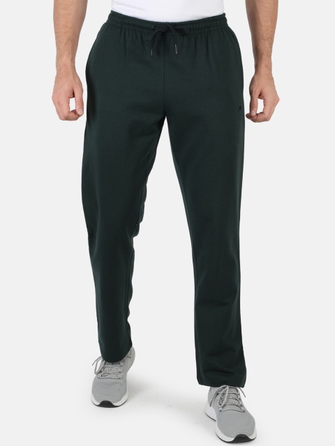 

Monte Carlo Men Green Solid Track Pants