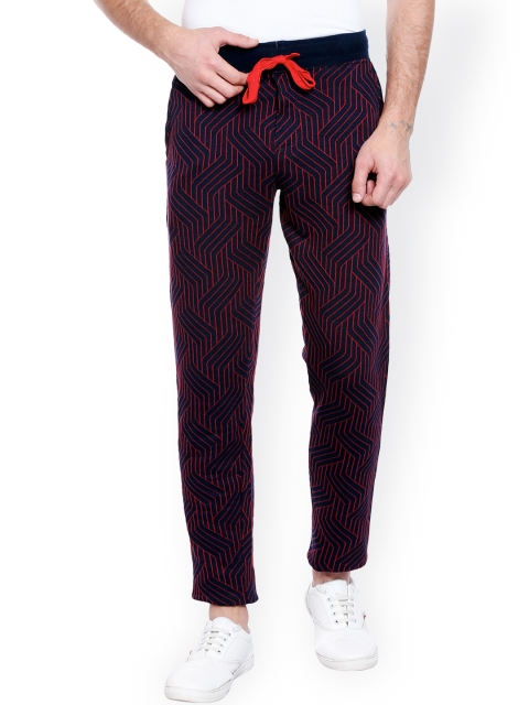 

AVOQ Men Navy & Red Printed Smart Fit Denim Track Pants, Navy blue