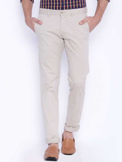 

Basics Men Beige Solid Tapered Fit Chino Trousers