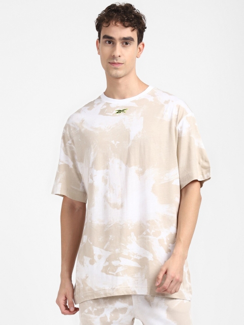 

Reebok Men Beige & Off White Printed Training or Gym T-shirt