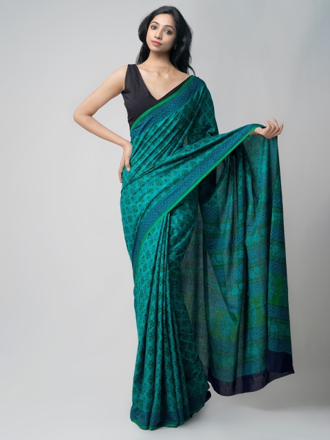 

Unnati Silks Green & Blue Printed Handloom Sustainable Pure Cotton Patola Saree