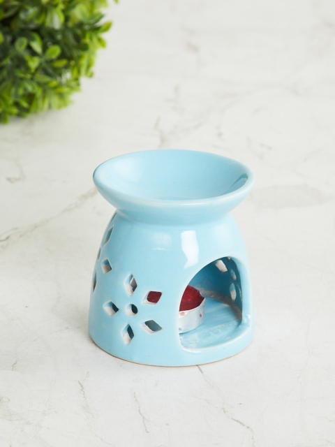 

Home Centre Blue Ceramic Oil Burner