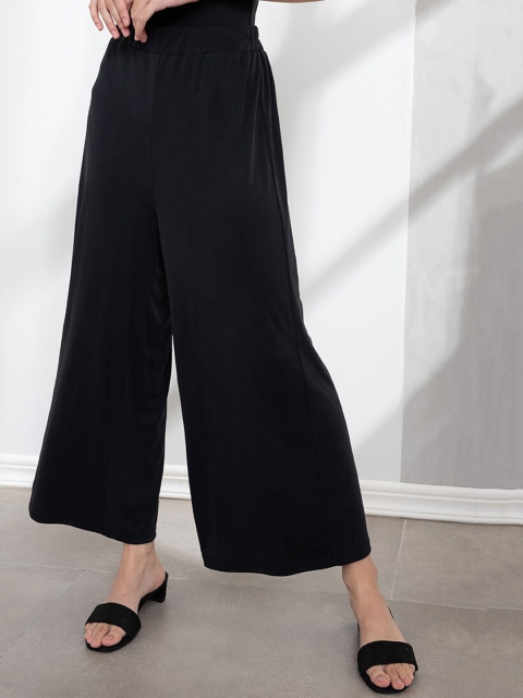 

ORIGIN BY ZALORA Women Black Solid Flared Trouser